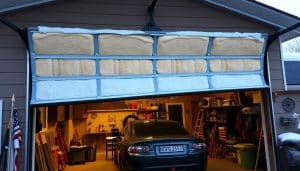 Can overhead garage doors be insulated?