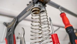 What is The Difference Between Torsion and Extension Springs?